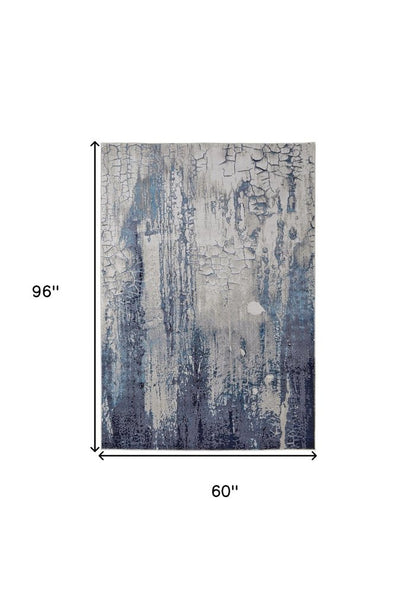 5' X 8' Ivory and Blue Abstract Power Loom Distressed Non Skid Area Rug