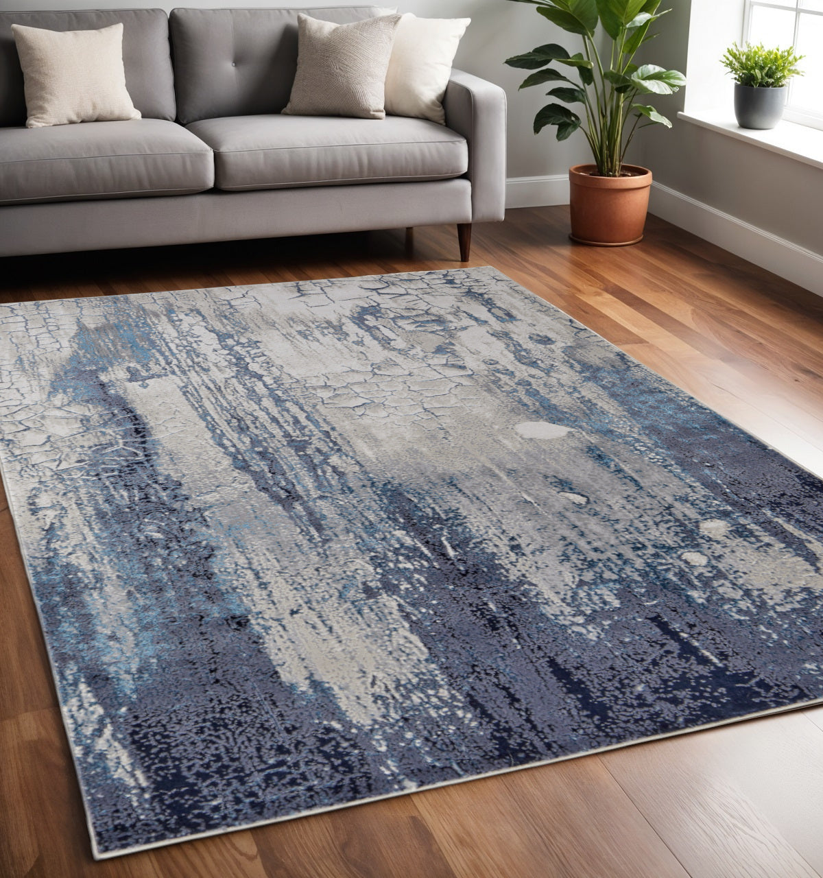 4' X 6' Ivory and Blue Abstract Power Loom Distressed Non Skid Area Rug