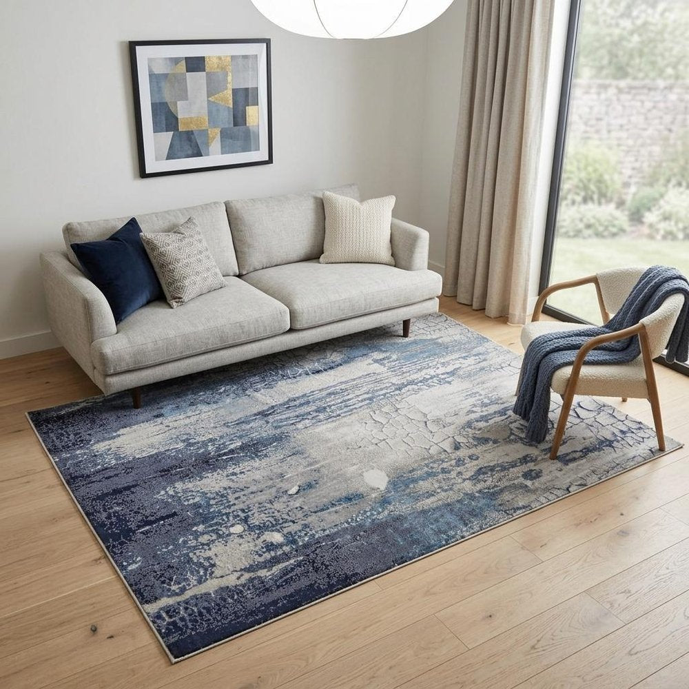 5' X 8' Ivory and Blue Abstract Power Loom Distressed Non Skid Area Rug