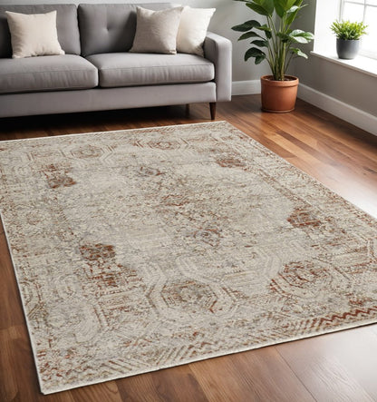 8' X 10' Gray Ivory And Burnt Orange Oriental Distressed Area Rug With Fringe