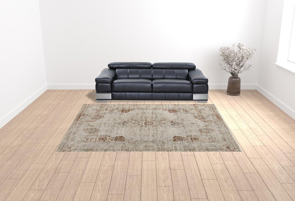 8' X 10' Gray Ivory And Burnt Orange Oriental Distressed Area Rug With Fringe