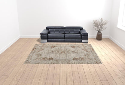 8' X 10' Gray Ivory And Burnt Orange Oriental Distressed Area Rug With Fringe