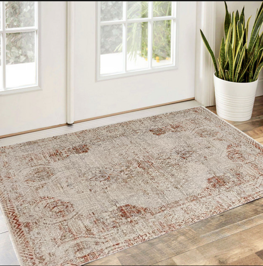 10' Tan Ivory And Orange Floral Power Loom Distressed Runner Rug With Fringe