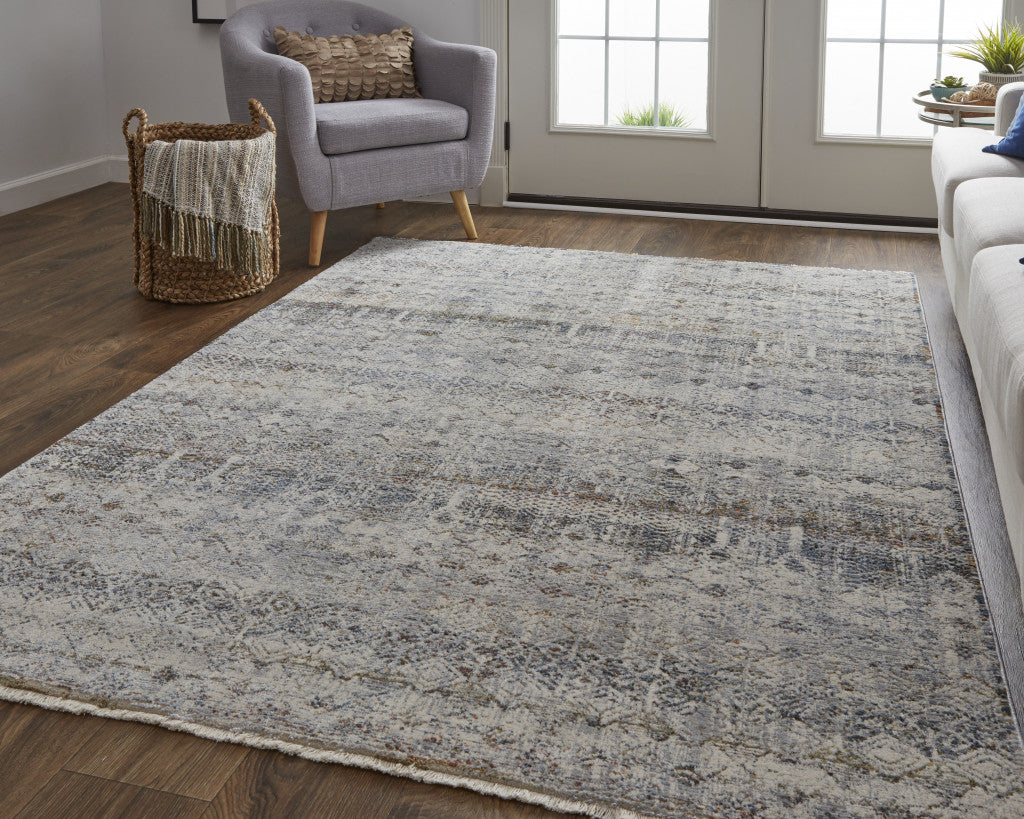 5' X 8' Tan Ivory And Blue Geometric Power Loom Distressed Area Rug With Fringe