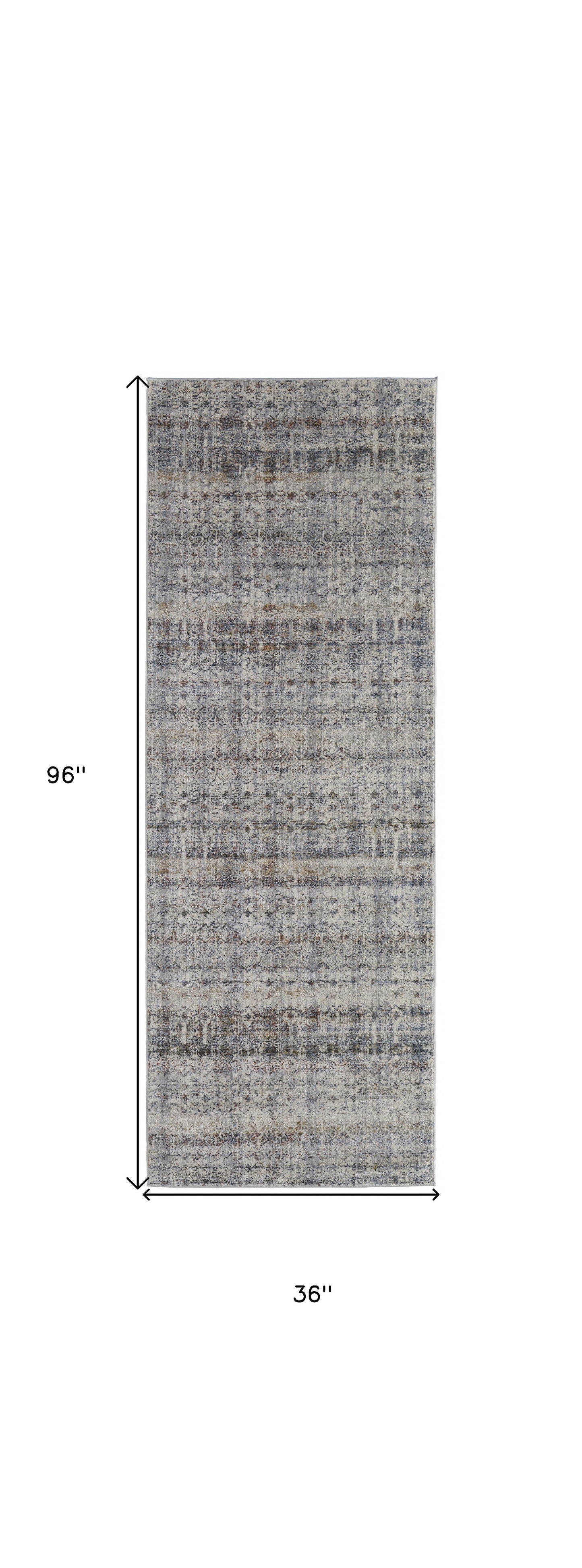8' X 10' Tan Ivory And Blue Geometric Power Loom Distressed Area Rug With Fringe