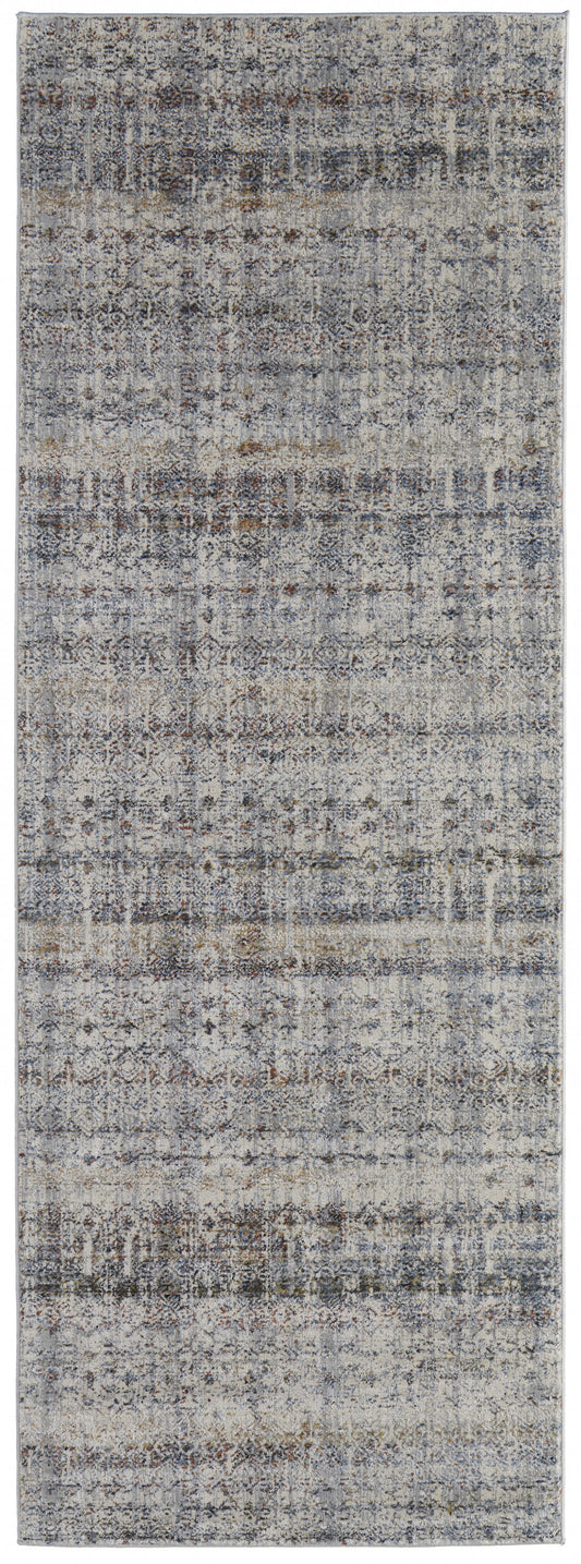 5' X 8' Tan Ivory And Blue Geometric Power Loom Distressed Area Rug With Fringe
