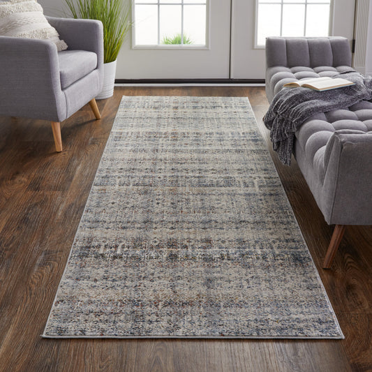 5' X 8' Tan Ivory And Blue Geometric Power Loom Distressed Area Rug With Fringe