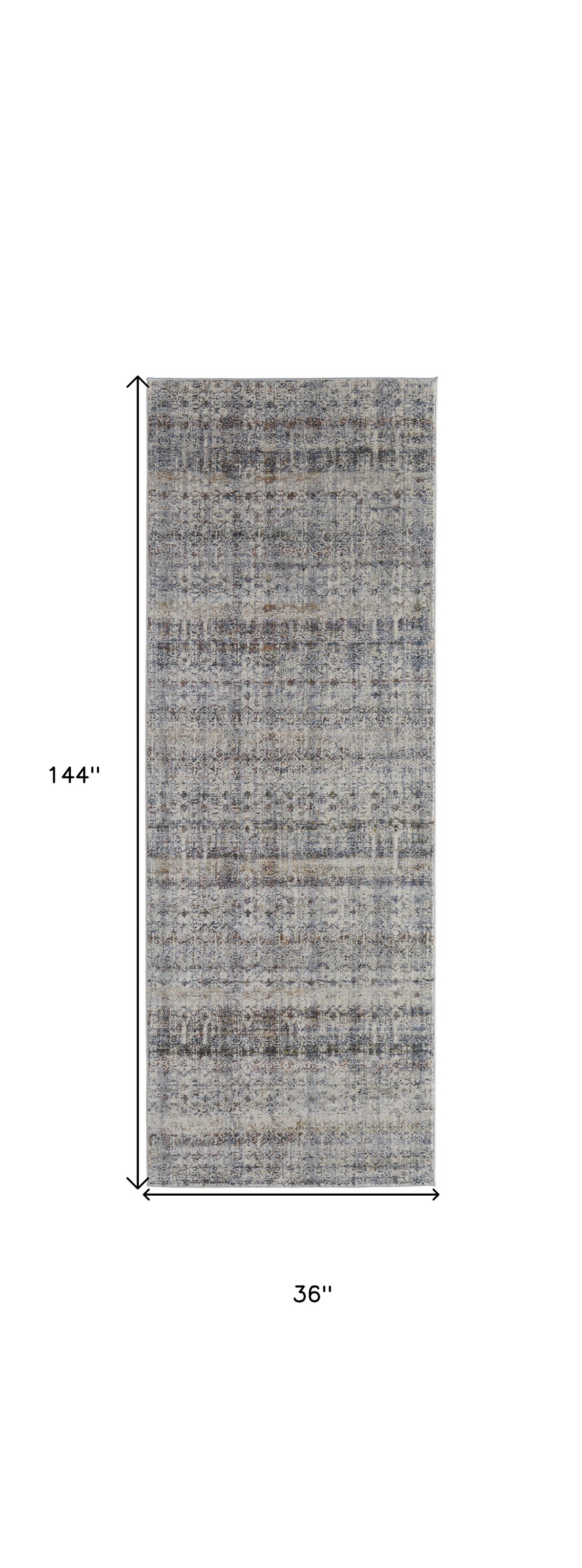 5' X 8' Tan Ivory And Blue Geometric Power Loom Distressed Area Rug With Fringe