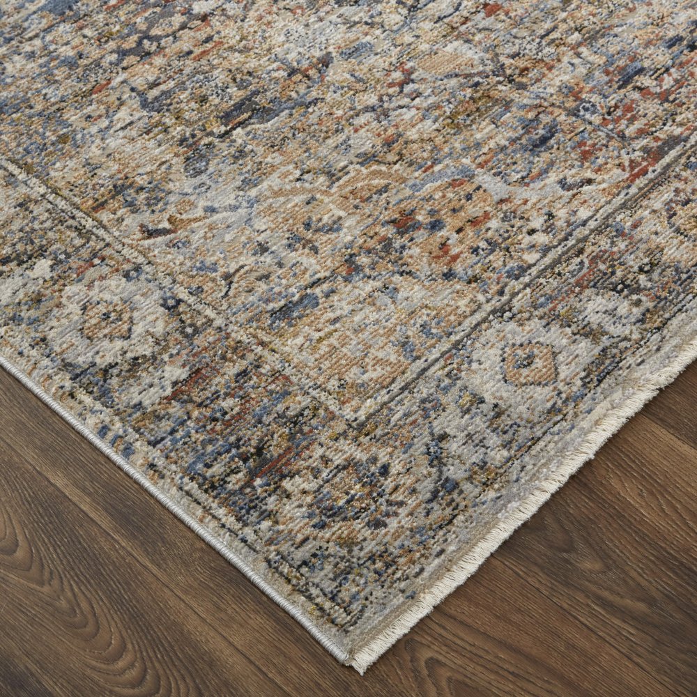 8' X 10' Tan Blue And Burnt Orange Oriental Distressed Area Rug With Fringe