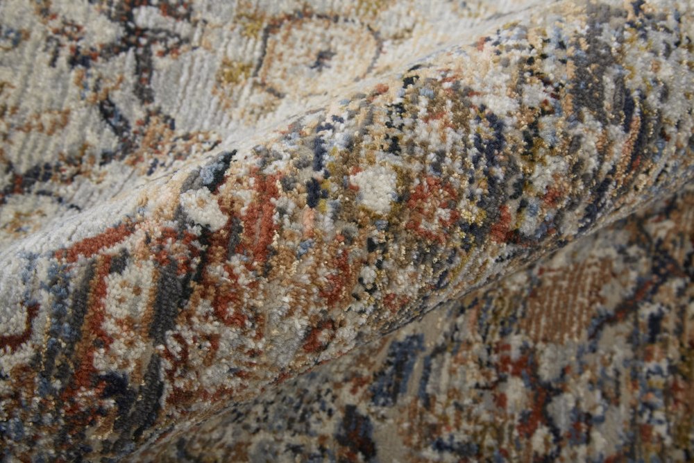 8' X 10' Tan Blue And Burnt Orange Oriental Distressed Area Rug With Fringe