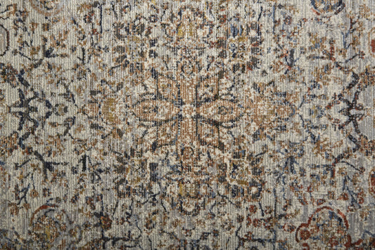 5' X 8' Tan Orange And Blue Floral Power Loom Distressed Area Rug With Fringe