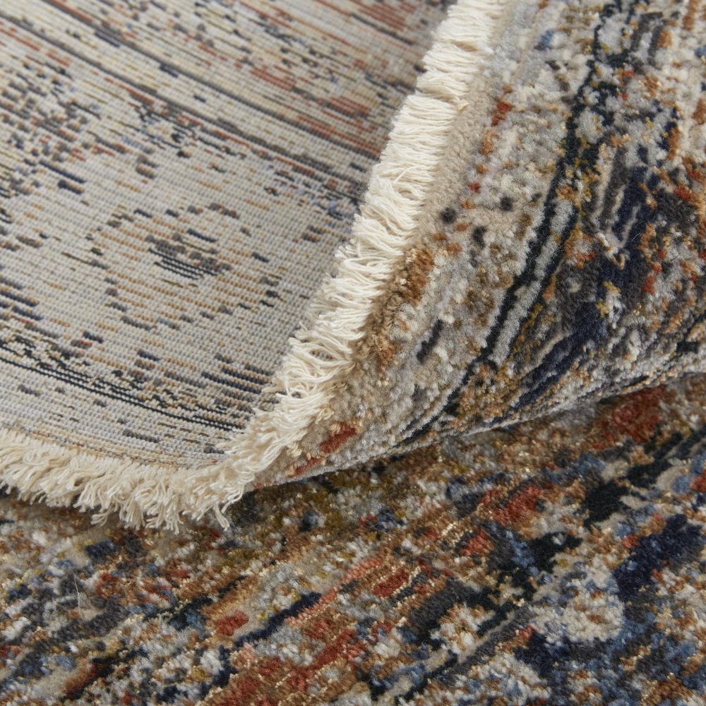 8' X 10' Tan Blue And Burnt Orange Oriental Distressed Area Rug With Fringe