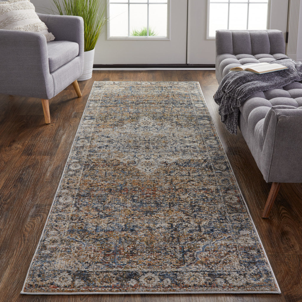 8' X 10' Tan Orange And Blue Floral Power Loom Distressed Area Rug With Fringe