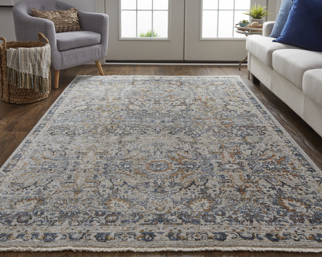 12' X 15' Tan Blue And Orange Floral Power Loom Distressed Area Rug With Fringe