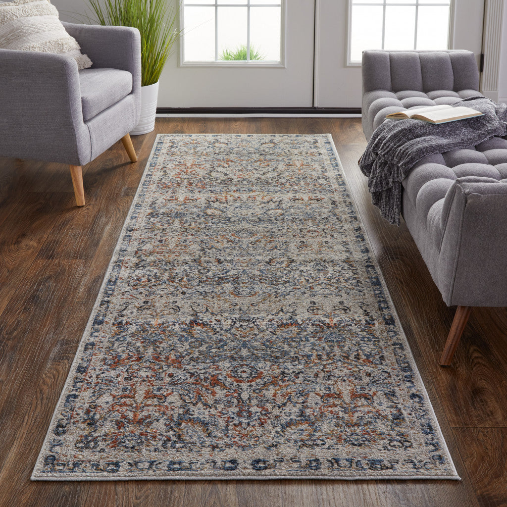 12' X 15' Tan Blue And Orange Floral Power Loom Distressed Area Rug With Fringe