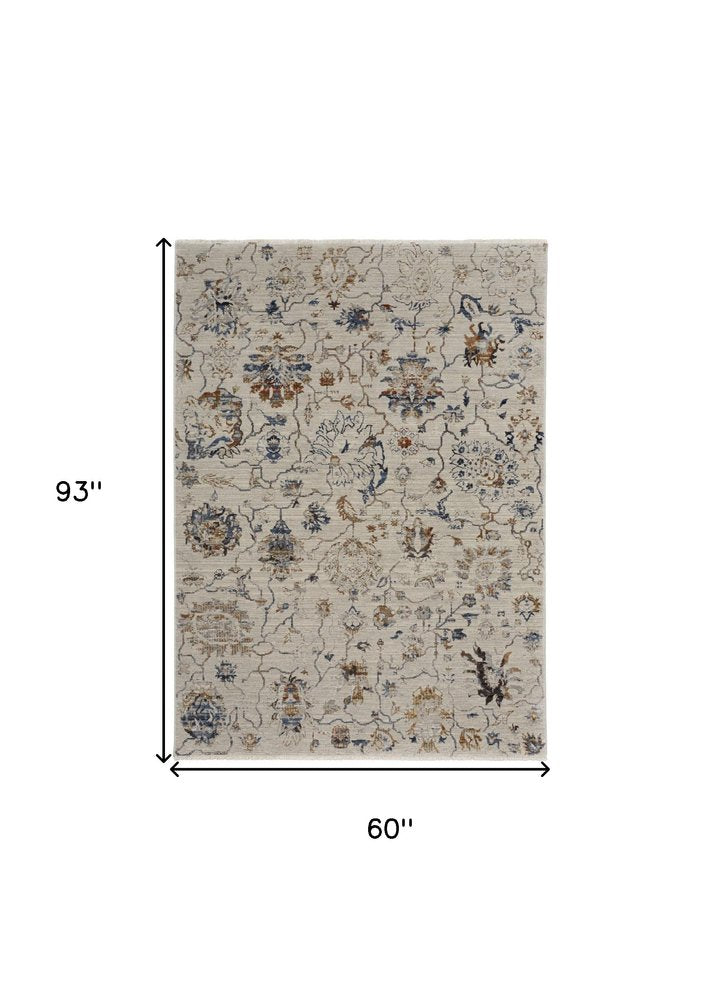 8' X 10' Ivory Blue And Burnt Orange Floral Distressed Area Rug With Fringe