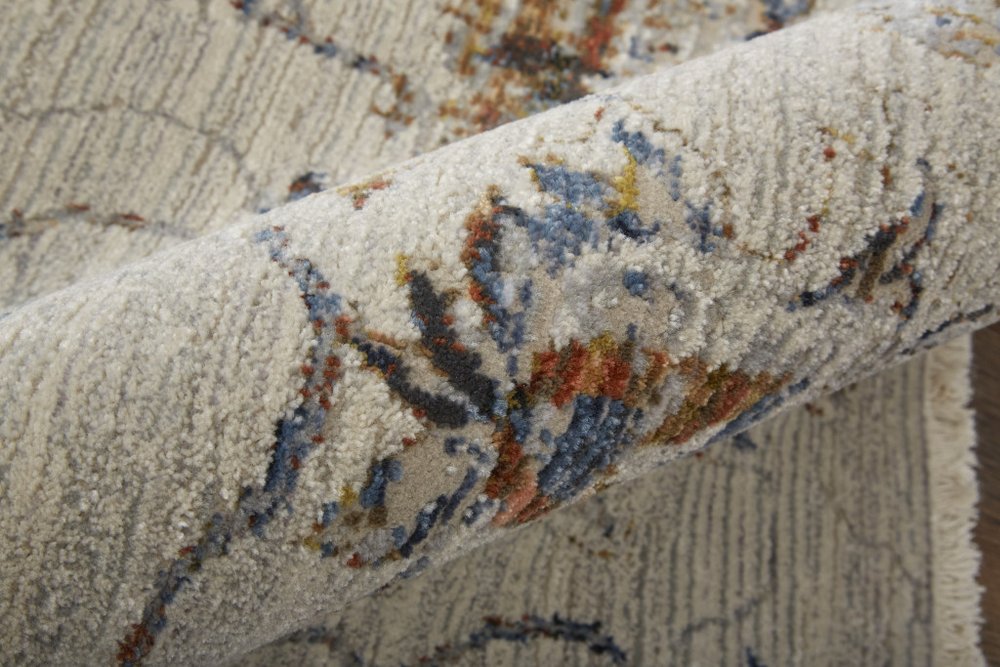 8' X 10' Ivory Blue And Burnt Orange Floral Distressed Area Rug With Fringe