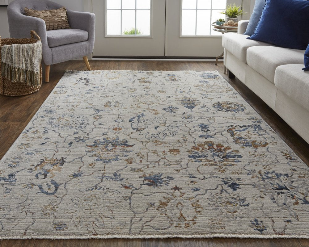 8' X 10' Ivory Blue And Burnt Orange Floral Distressed Area Rug With Fringe