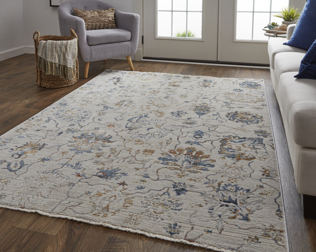 8' X 10' Ivory Orange And Blue Floral Power Loom Distressed Area Rug With Fringe