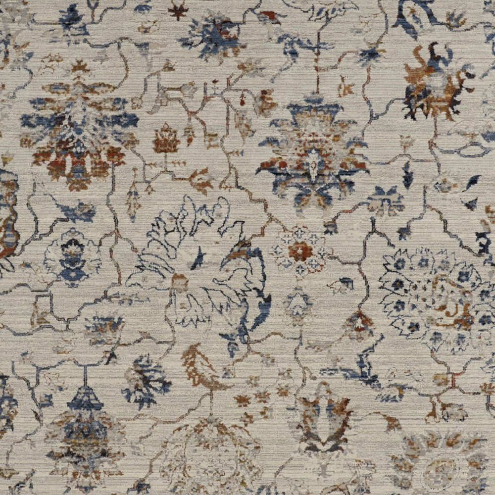 8' X 10' Ivory Blue And Burnt Orange Floral Distressed Area Rug With Fringe