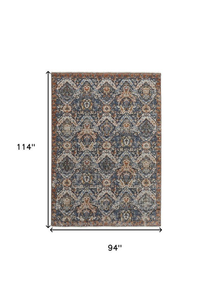 5' X 8' Ivory Blue And Burnt Orange Floral Area Rug With Fringe