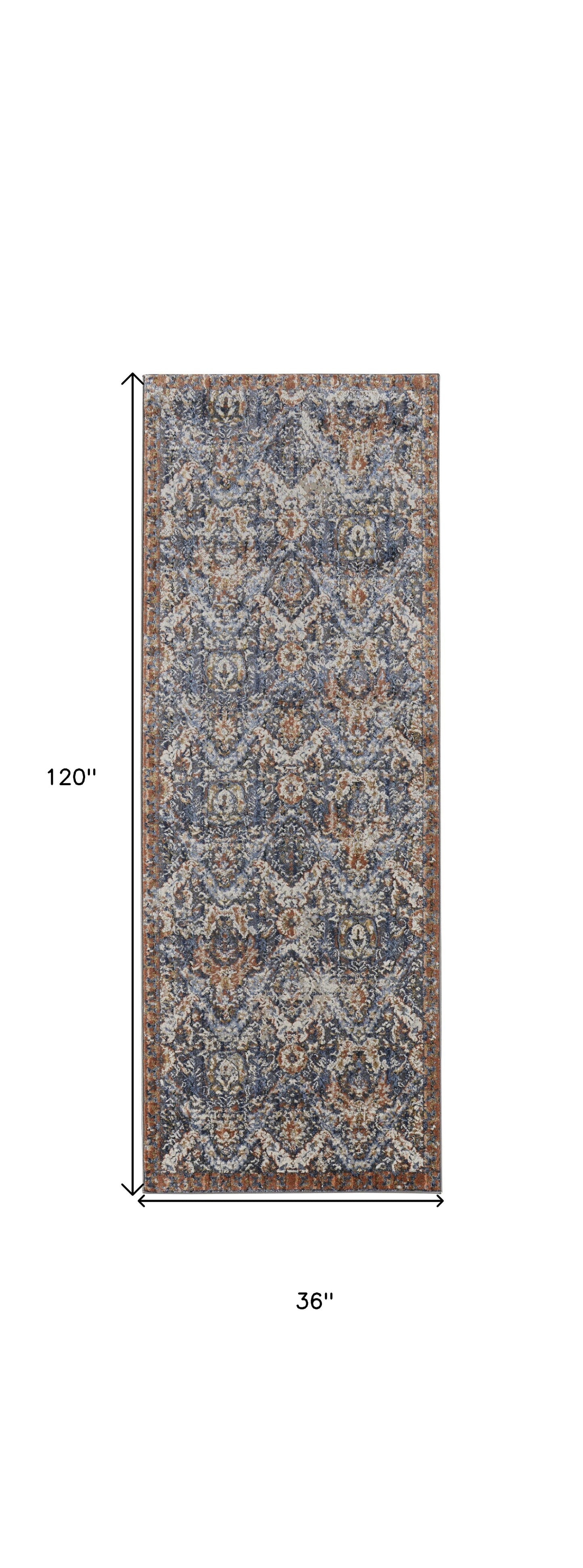 5' X 8' Blue Orange And Ivory Floral Power Loom Area Rug With Fringe