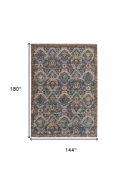5' X 8' Ivory Blue And Burnt Orange Floral Area Rug With Fringe