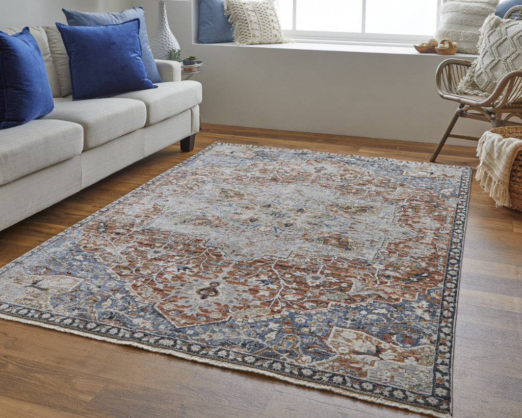 5' X 8' Orange Ivory And Blue Floral Power Loom Area Rug With Fringe