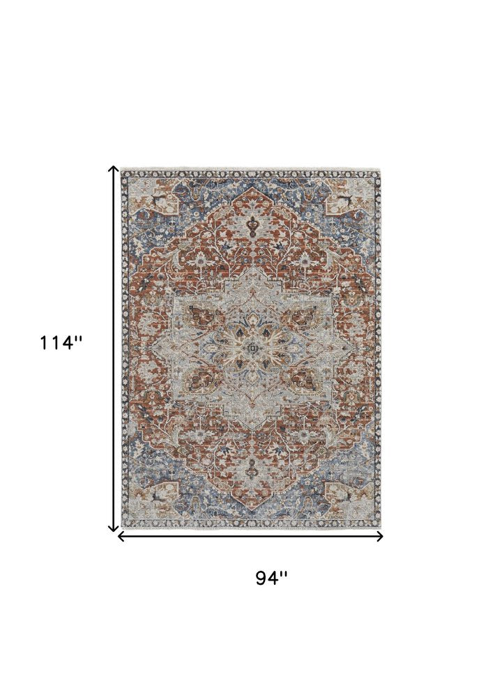 2' X 3' Burnt Orange Ivory And Blue Floral Area Rug With Fringe