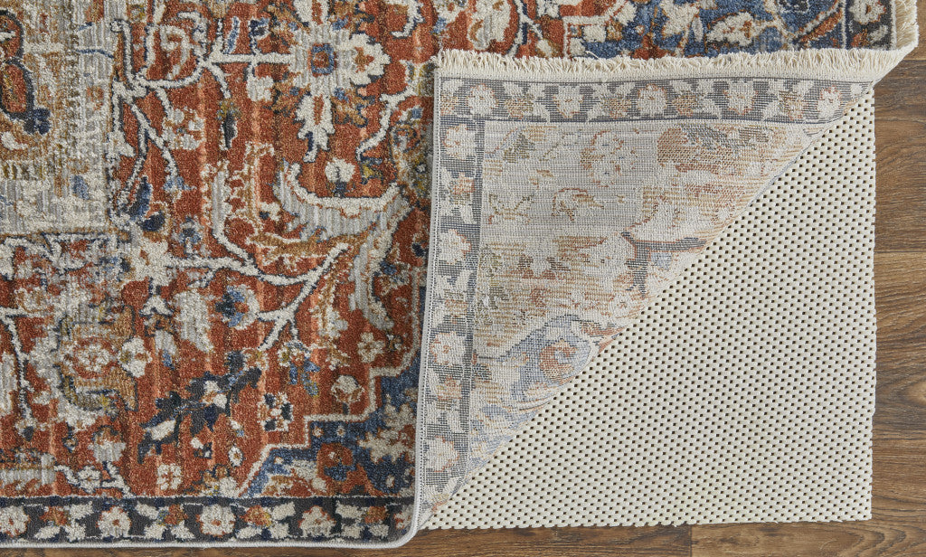 5' X 8' Orange Ivory And Blue Floral Power Loom Area Rug With Fringe