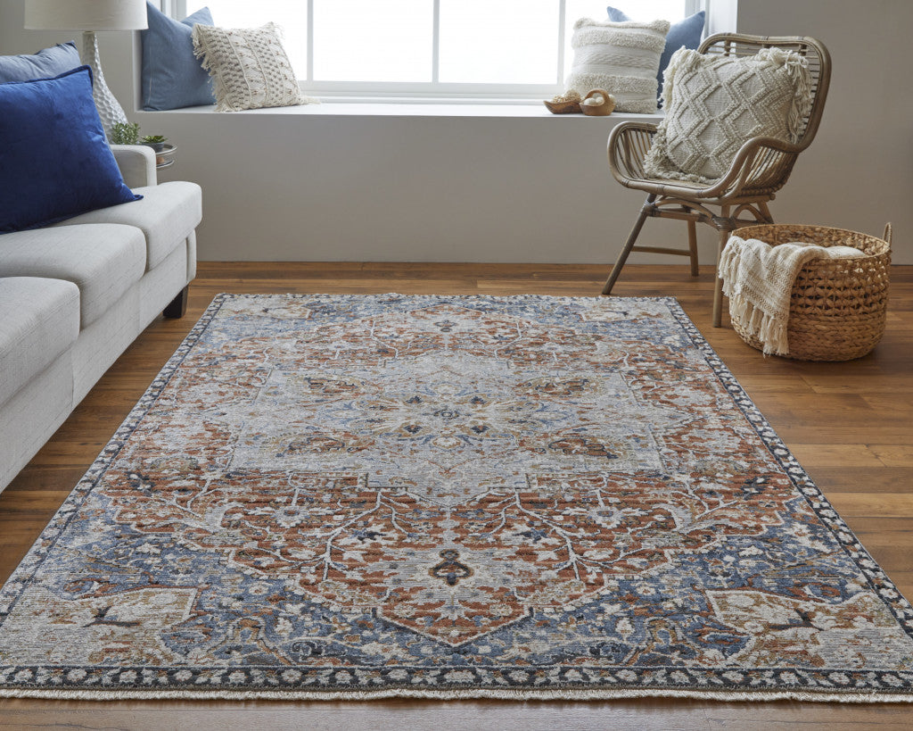 5' X 8' Orange Ivory And Blue Floral Power Loom Area Rug With Fringe