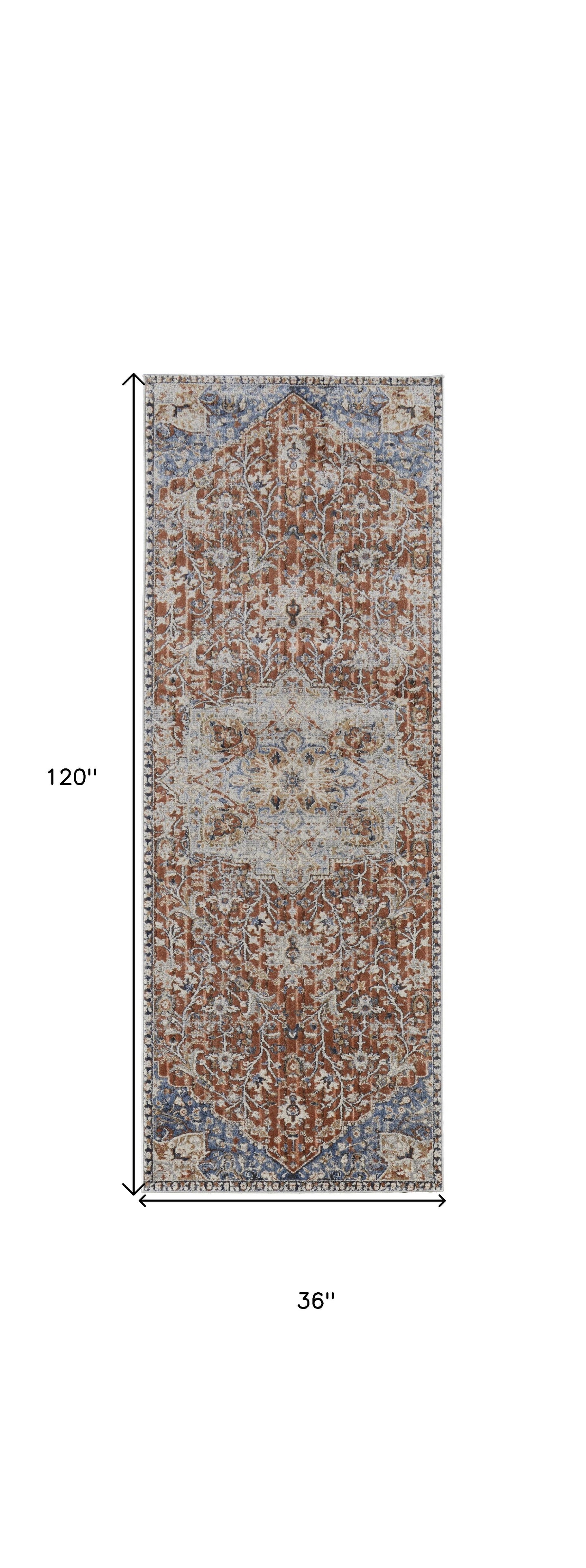 5' X 8' Orange Ivory And Blue Floral Power Loom Area Rug With Fringe