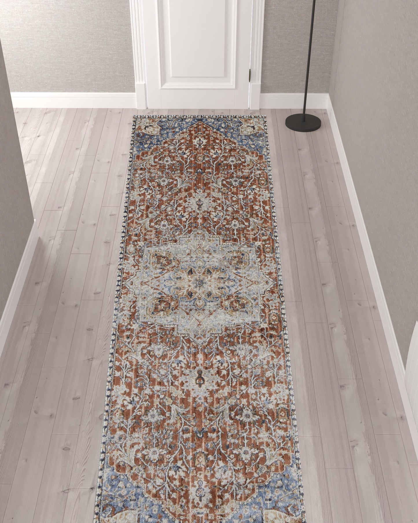 5' X 8' Orange Ivory And Blue Floral Power Loom Area Rug With Fringe