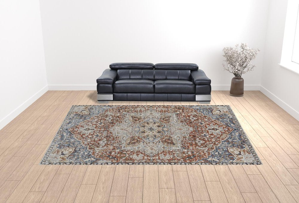 2' X 3' Burnt Orange Ivory And Blue Floral Area Rug With Fringe