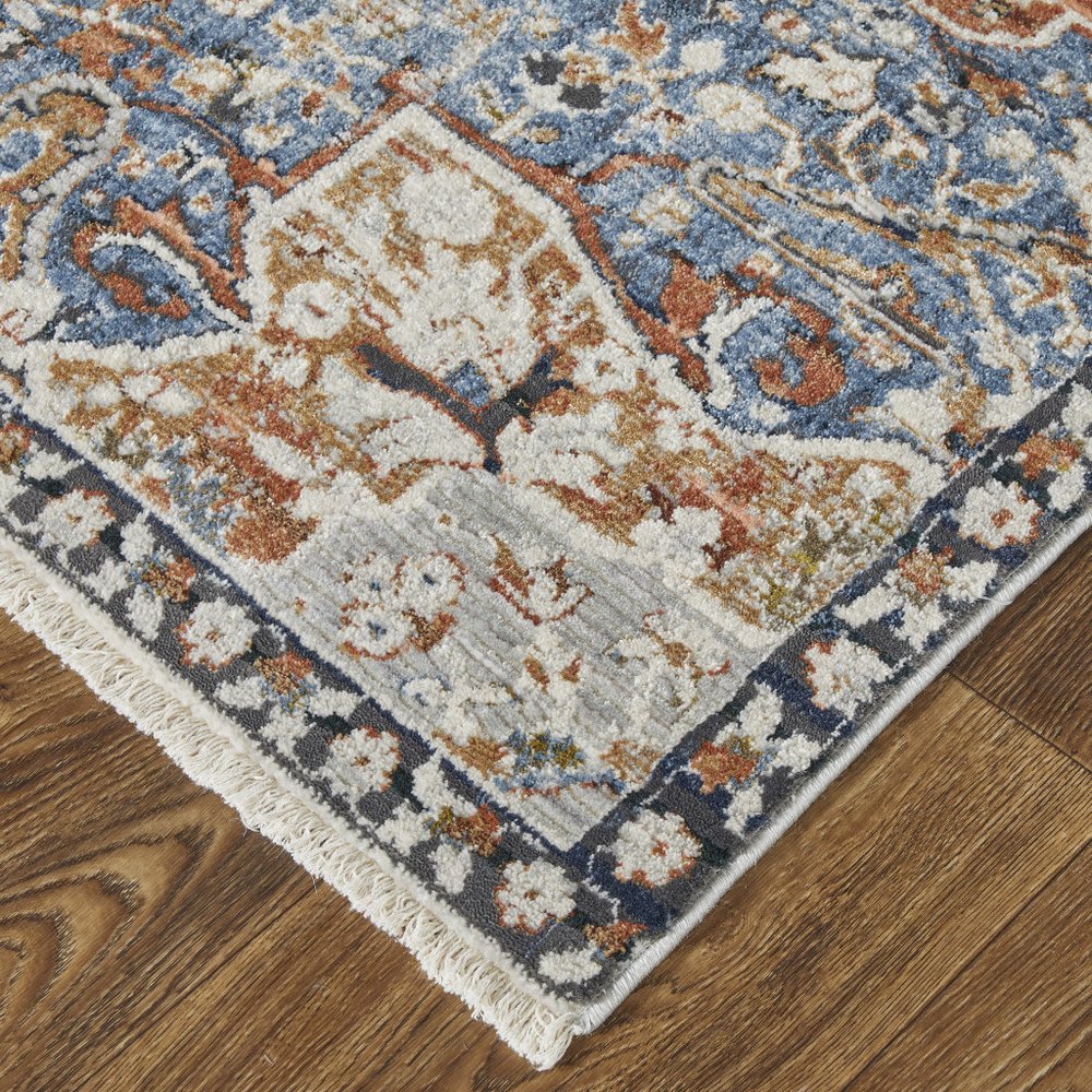 12' X 15' Burnt Orange Ivory And Blue Floral Area Rug With Fringe