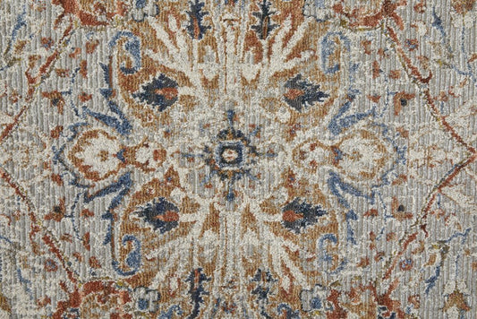 2' X 3' Burnt Orange Ivory And Blue Floral Area Rug With Fringe