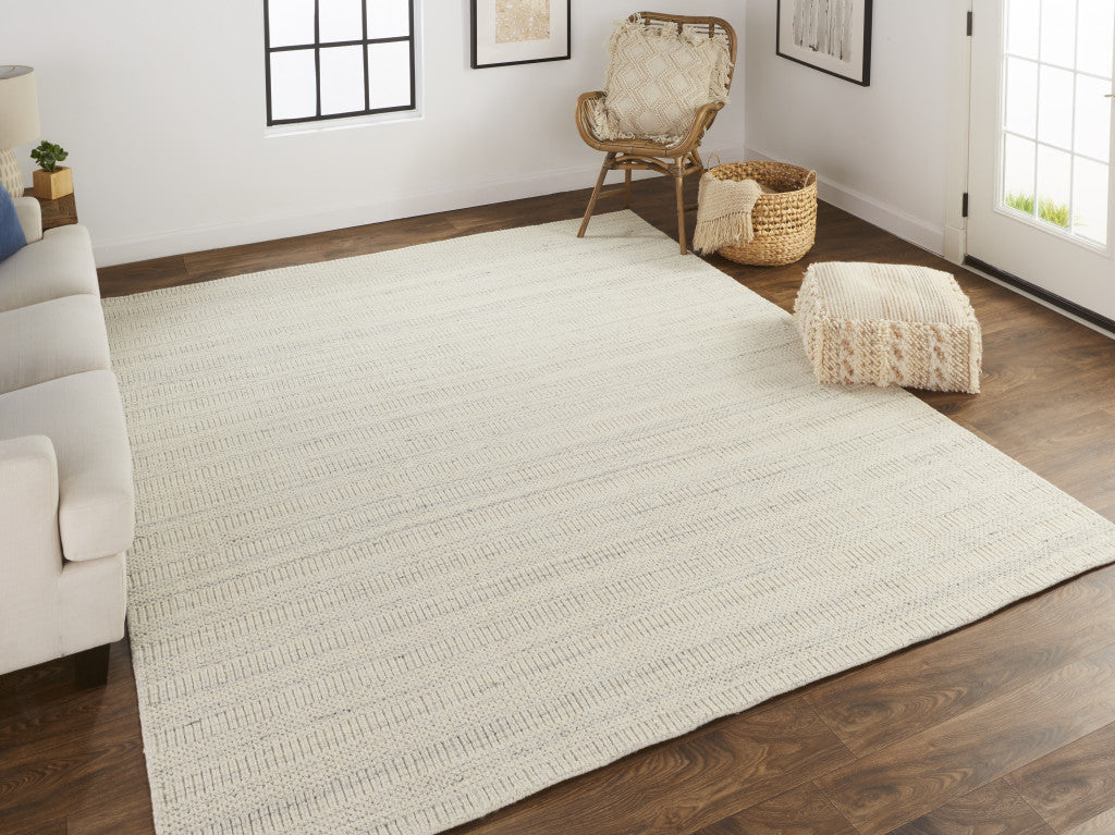 5' X 8' Ivory Wool Hand Woven Stain Resistant Area Rug