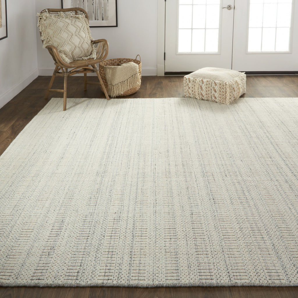 5' X 8' Ivory Wool Hand Woven Stain Resistant Area Rug