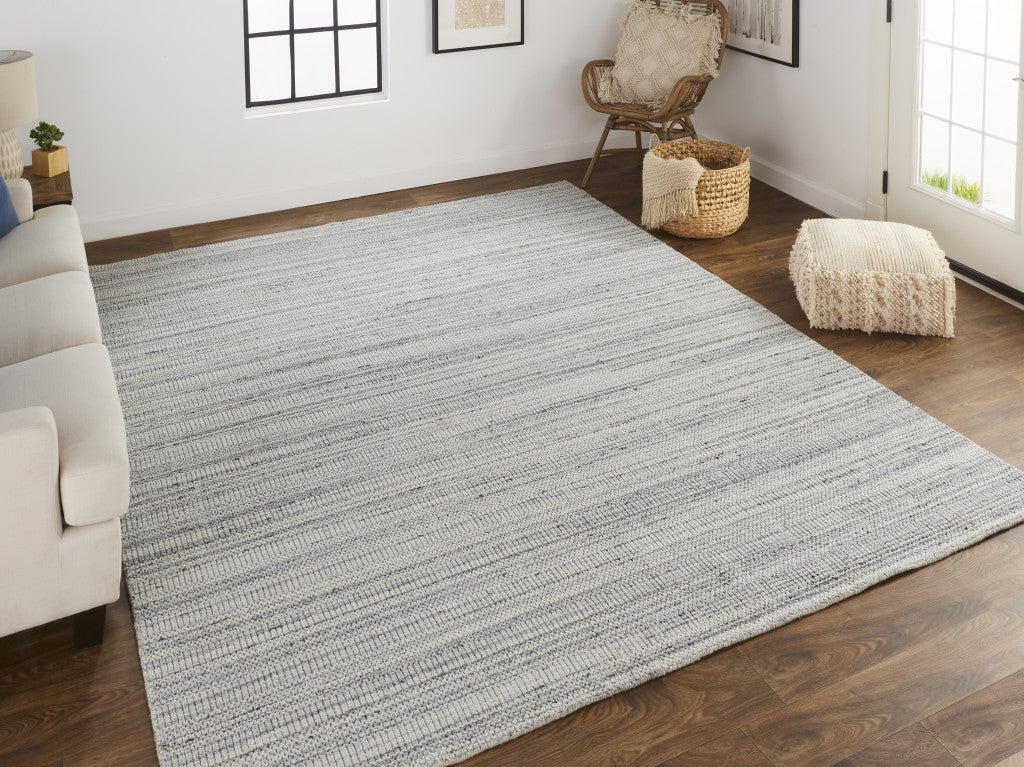 5' X 8' Ivory Wool Hand Woven Stain Resistant Area Rug