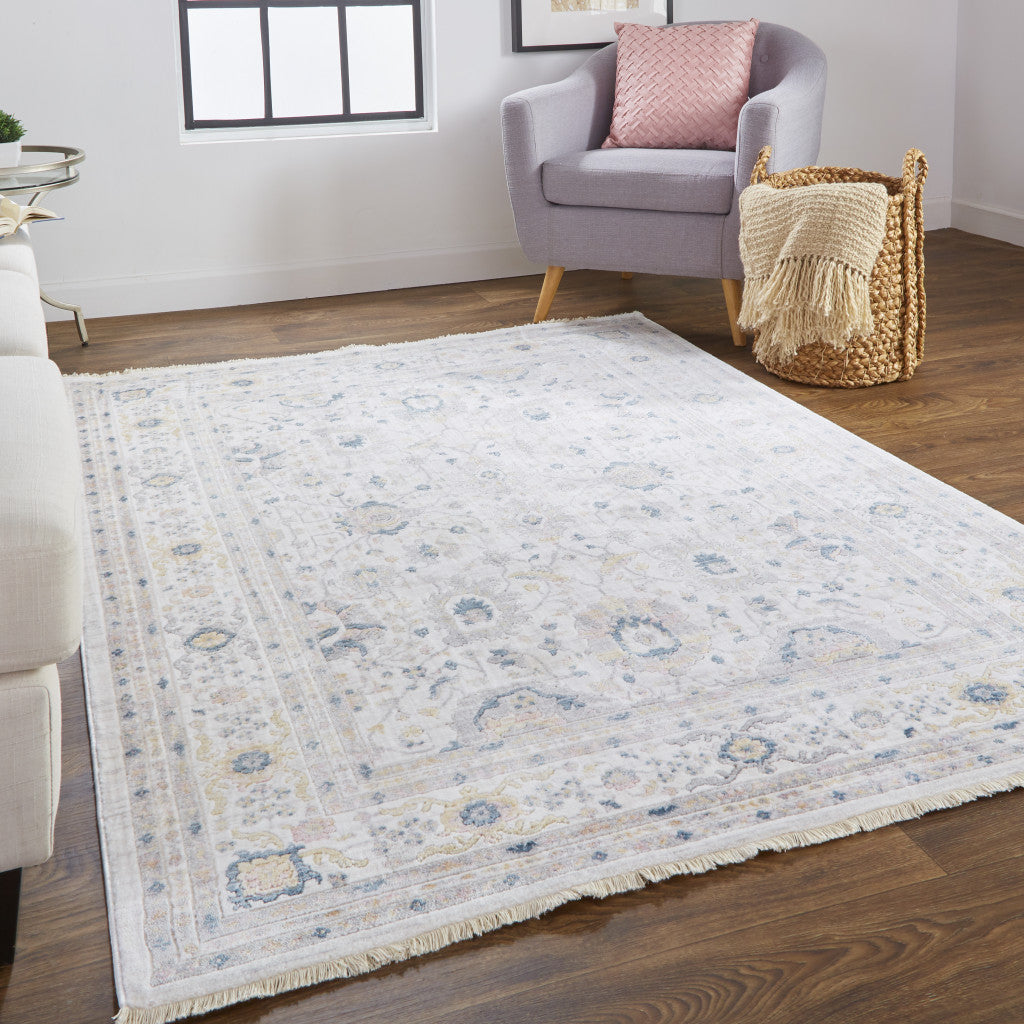 6' Tan Ivory And Blue Round Floral Stain Resistant Area Rug