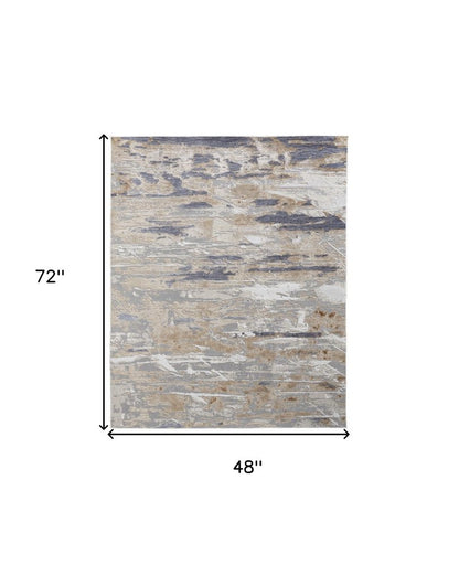 4' X 6' Tan Ivory And Blue Abstract Distressed Area Rug