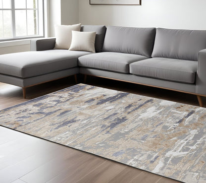 5' X 8' Tan Ivory And Blue Abstract Distressed Area Rug