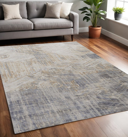 8' X 10' Ivory Gray And Tan Abstract Distressed Area Rug