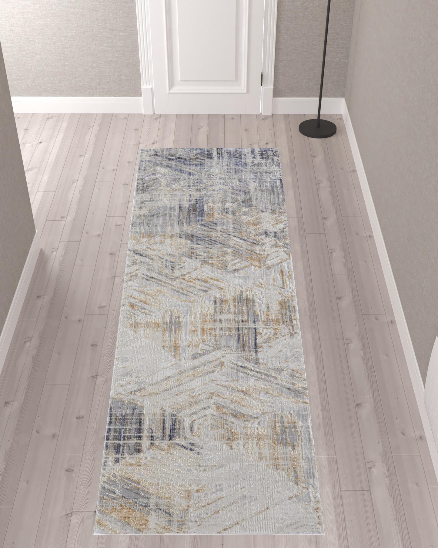 5' X 8' Tan Ivory And Gray Abstract Power Loom Distressed Area Rug