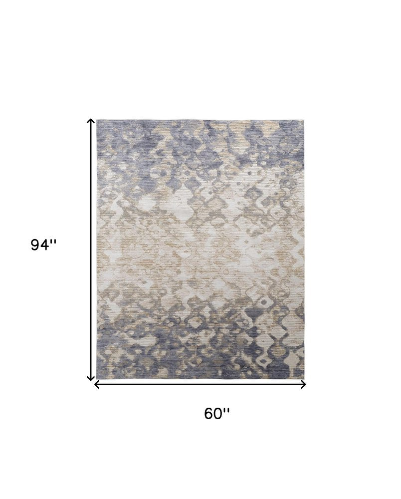 5' X 8' Ivory Tan And Blue Abstract Distressed Area Rug