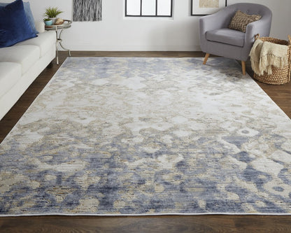 8' X 10' Ivory Tan And Blue Abstract Distressed Area Rug