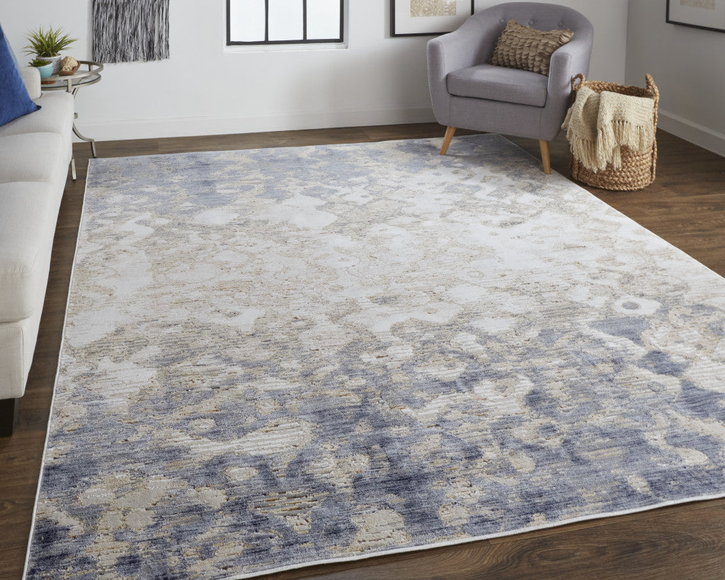 5' X 8' Tan Ivory And Blue Abstract Power Loom Distressed Area Rug