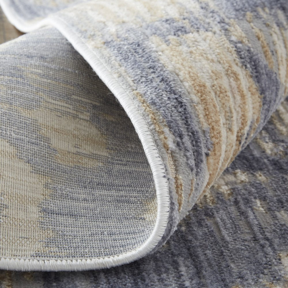 5' X 8' Ivory Tan And Blue Abstract Distressed Area Rug