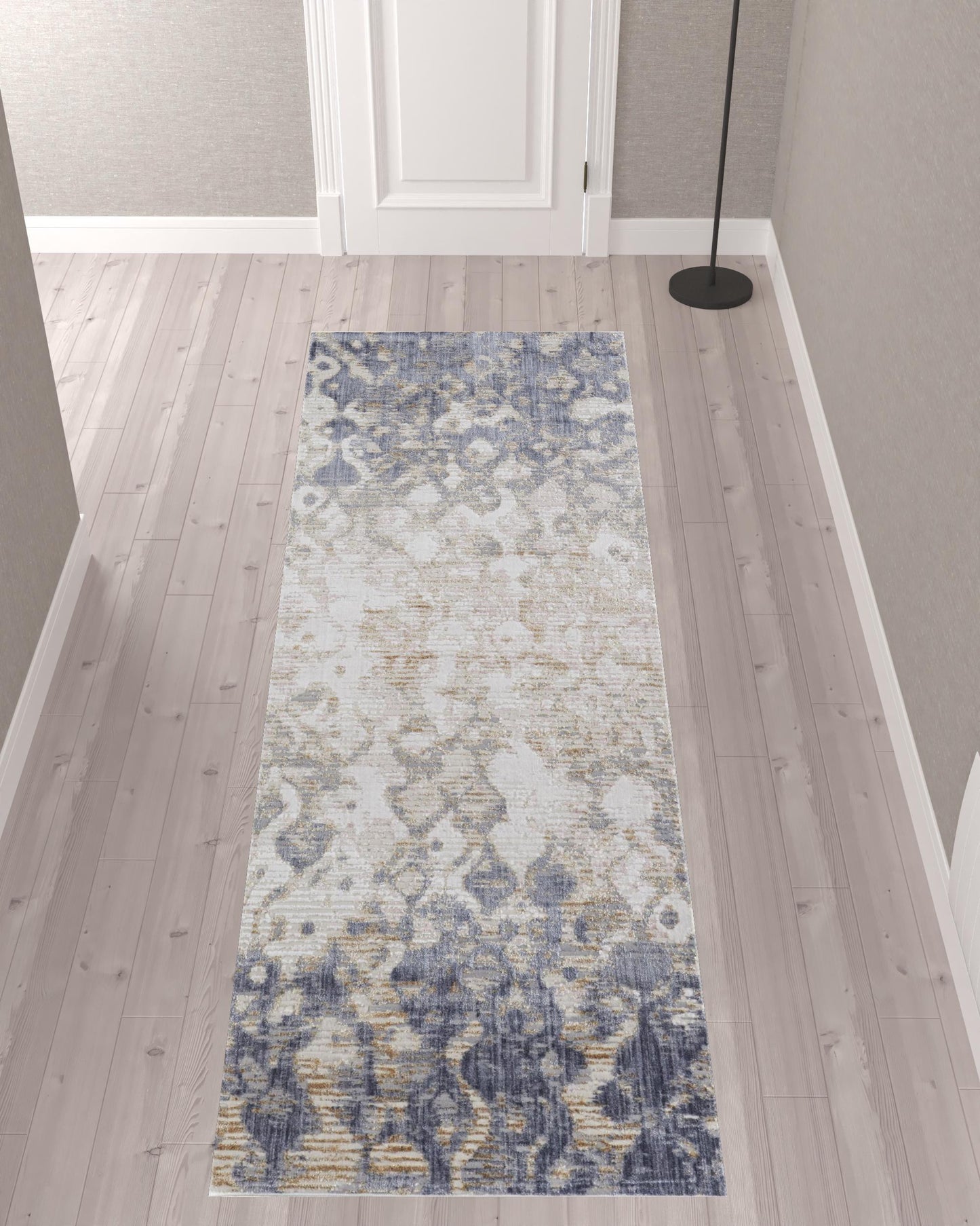 5' X 8' Tan Ivory And Blue Abstract Power Loom Distressed Area Rug