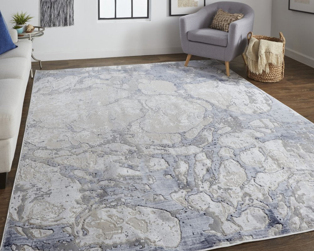 4' X 6' Ivory And Blue Abstract Power Loom Distressed Area Rug
